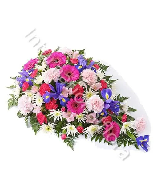 Composizione funebre di Iris, Gerbere, Garofani e Crisantemi Fiori a Domicilio